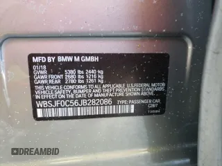 2018 BMW M5 z VIN WBSJF0C56JB282086, wystawiony jako Copart lot #37483454 z przebiegiem Nie podano mil oraz Szkoda całkowita • Salvage title. Historia ofert i sprzedaży dostępna na DreamBid. Obrazek 15.