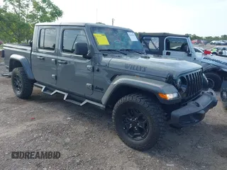 2021 Jeep Gladiator Willys с VIN 1C6HJTAG7ML513528, выставлен на аукционе IAAI как лот 42438235 с пробегом 83 334 миль миль и . История ставок и продаж доступна на DreamBid. Изображение 1.
