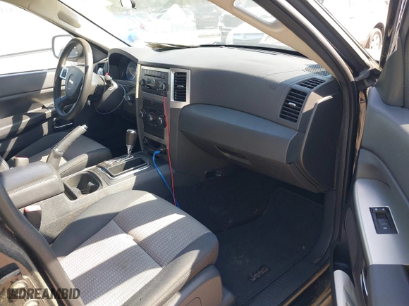 2010 Jeep Grand Cherokee Laredo with VIN 1J4PR4GK5AC120373, listed as a IAAI auction lot 42071835 with 101,949 mi miles. Bid and sale history available at carsss.com. Image 5.