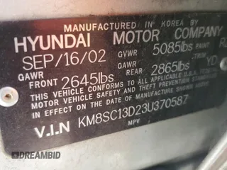 2003 Hyundai Santa Fe GLS z VIN KM8SC13D23U370587, wystawiony jako Copart lot #52775885 z przebiegiem Nie podano mil oraz Szkoda całkowita • Salvage title. Historia ofert i sprzedaży dostępna na DreamBid. Obrazek 13.