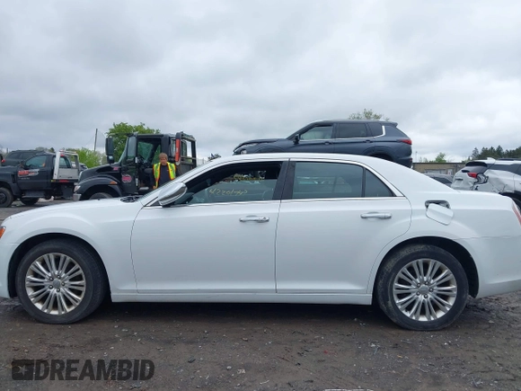 2014 Chrysler 300 C with VIN 2C3CCAKG5EH200996, listed as a IAAI auction lot 42201747 with 156,121 mi miles and . Bid and sale history available at carsss.com. Image 14.
