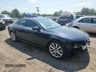 2016 Audi A7 z VIN WAU2MBFC1GN018267, wystawiony jako Copart lot #62498205 z przebiegiem 43 072 mil mil oraz Szkoda całkowita • Salvage title. Historia ofert i sprzedaży dostępna na DreamBid. Obrazek 4.
