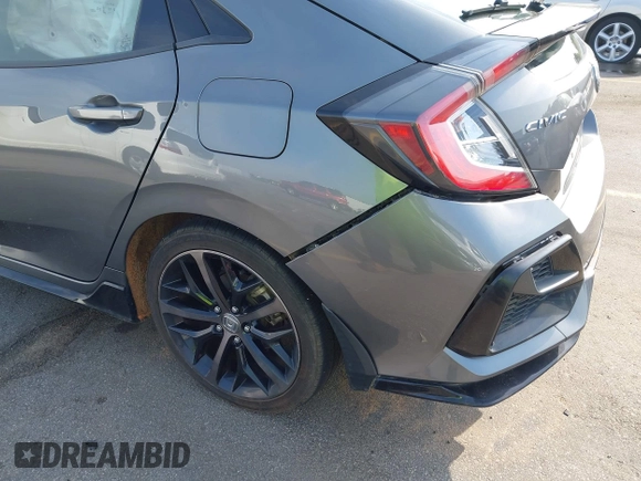 2021 Honda Civic Sport with VIN SHHFK7H44MU217741, listed as a IAAI auction lot 42029373 with 68,572 mi miles and . Bid and sale history available at DreamBid. Image 19.