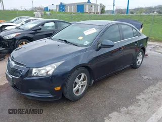 2014 Chevrolet Cruze 1LT with VIN 1G1PC5SB5E7400967, listed as a IAAI auction lot 41976254 with 143,068 mi miles and . Bid and sale history available at DreamBid. Image 18.