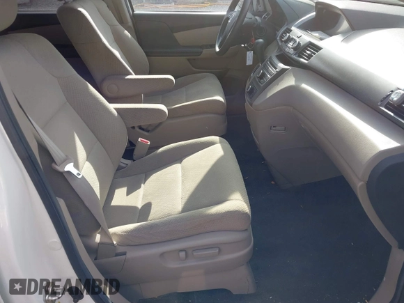 2014 Honda Odyssey LX with VIN 5FNRL5H24EB001551, listed as a IAAI auction lot 41879040 with 119,200 mi miles and . Bid and sale history available at DreamBid. Image 5.