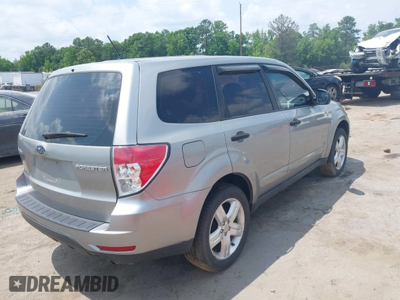 2009 Subaru Forester X with VIN JF2SH616X9H718811, listed as a IAAI auction lot 42446220 with 232,578 mi miles and . Bid and sale history available at DreamBid. Image 4.