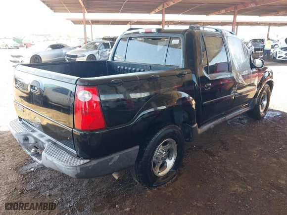 2005 Ford Explorer Sport Trac XLS with VIN 1FMZU67K65UA48667, listed as a IAAI auction lot 41637238 with 213,925 mi miles. Bid and sale history available at carsss.com. Image 4.