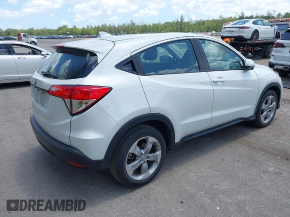 2021 Honda HR-V LX with VIN 3CZRU5H33MM728433, listed as a IAAI auction lot 42077620 with 34,861 mi miles and . Bid and sale history available at DreamBid. Image 4.