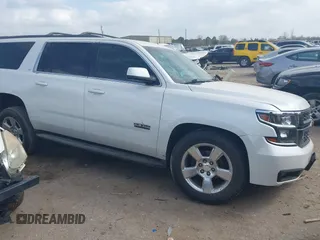 2016 Chevrolet Suburban LT with VIN 1GNSCHKC9GR273201, listed as a IAAI auction lot 41743971 with 180,945 mi miles. Bid and sale history available at carsss.com. Image 1.