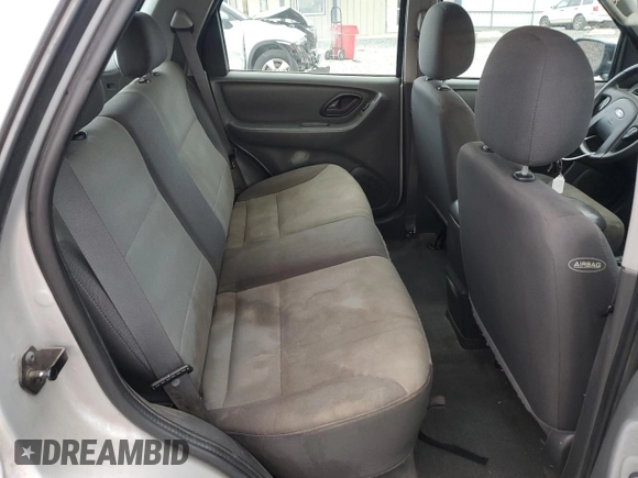 2004 Ford Escape with VIN 1FMCU02144KB63439, listed as a Copart auction lot 85310514 with 275,625 mi miles and Salvage title. Bid and sale history available at DreamBid. Image 11.