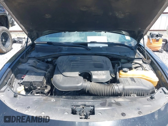 2015 Dodge Charger SXT with VIN 2C3CDXHG2FH852208, listed as a IAAI auction lot 42120021 with 156,486 mi miles and . Bid and sale history available at DreamBid. Image 10.