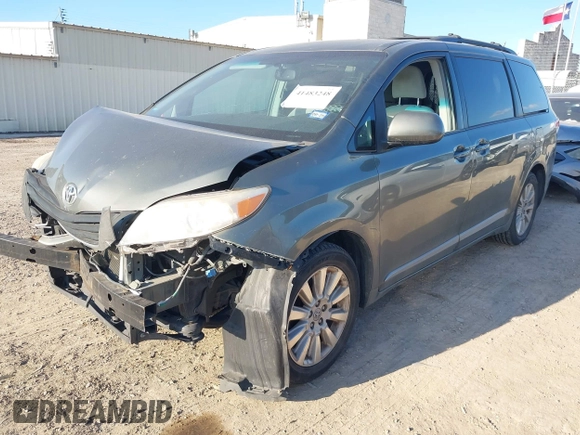 2012 Toyota Sienna LE with VIN 5TDJK3DCXCS039801, listed as a IAAI auction lot 41483248 with 165,548 mi miles. Bid and sale history available at carsss.com. Image 2.