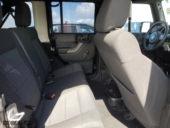 2012 Jeep Wrangler Unlimited Sport with VIN 1C4BJWDG1CL285035, listed as a Copart auction lot 51269065 with 118,327 mi miles and Salvage Title. Bid and sale history available at carsss.com. Image 11.