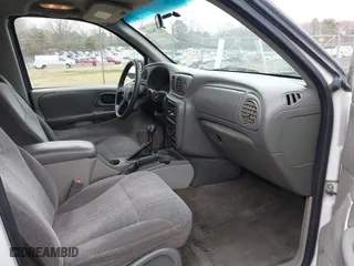 2004 Chevrolet TrailBlazer LT with VIN 1GNDS13S242323532, listed as a IAAI auction lot 41704397 with 262,923 mi miles. Bid and sale history available at carsss.com. Image 5.