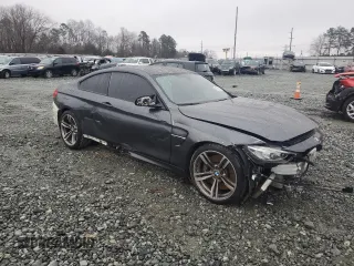 2015 BMW M4 with VIN WBS3R9C54FK330180, listed as a Copart auction lot 40706044 with 69,474 mi miles. Bid and sale history available at carsss.com. Image 4.
