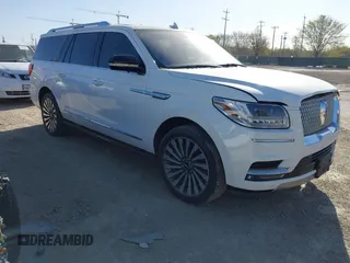 2020 Lincoln Navigator Reserve z VIN 5LMJJ3KT5LEL03009, wystawiony jako IAAI lot #41814201 z przebiegiem Nie podano mil oraz . Historia ofert i sprzedaży dostępna na DreamBid. Obrazek 1.