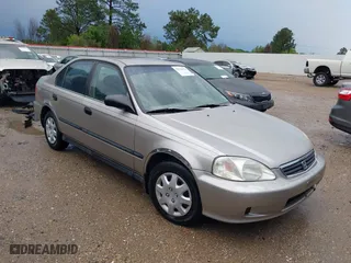 2000 Honda Civic DX with VIN 1HGEJ6620YL001675, listed as a IAAI auction lot 39908648 with 223,579 mi miles. Bid and sale history available at carsss.com. Image 1.