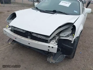 2003 Toyota MR2 Spyder with VIN JTDFR320X30062525, listed as a IAAI auction lot 41558074 with 42,493 mi miles. Bid and sale history available at carsss.com. Image 6.