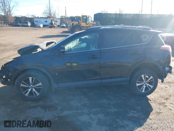 2018 Toyota RAV4 XLE with VIN 2T3RFREV2JW811214, listed as a IAAI auction lot 41458588 with 236,346 mi miles. Bid and sale history available at carsss.com. Image 13.