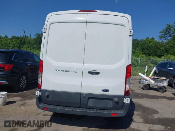 2017 Ford Transit with VIN 1FTYE2CM6HKB32372, listed as a IAAI auction lot 42247909 with 197,640 mi miles and . Bid and sale history available at DreamBid. Image 16.