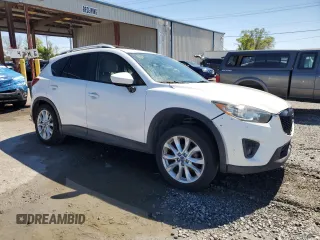 2014 Mazda CX-5 Grand Touring with VIN JM3KE4DY6E0363211, listed as a Copart auction lot 48352315 with 214,298 mi miles and Salvage Title. Bid and sale history available at DreamBid. Image 4.