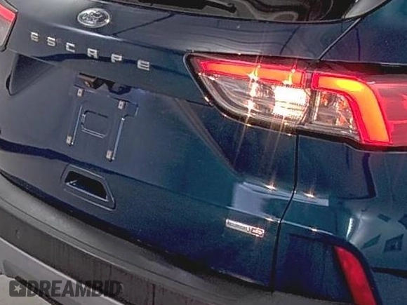 2020 Ford Escape SE with VIN 1FMCU9G65LUB80892, listed as a IAAI auction lot 42715723 with 86,362 mi miles and . Bid and sale history available at DreamBid. Image 18.