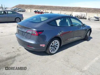 2023 Tesla Model 3 with VIN 5YJ3E1EAXPF652089, listed as a IAAI auction lot 42666520 with 17,679 mi miles and . Bid and sale history available at DreamBid. Image 4.