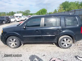 2013 Honda Pilot Touring with VIN 5FNYF3H93DB031630, listed as a IAAI auction lot 42237899 with 198,523 mi miles and . Bid and sale history available at DreamBid. Image 15.