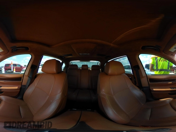 2012 BMW 7 Series 750Li with VIN WBAKB8C54CC964576, listed as a IAAI auction lot 42499443 with 78,728 mi miles and . Bid and sale history available at DreamBid. Image 19.