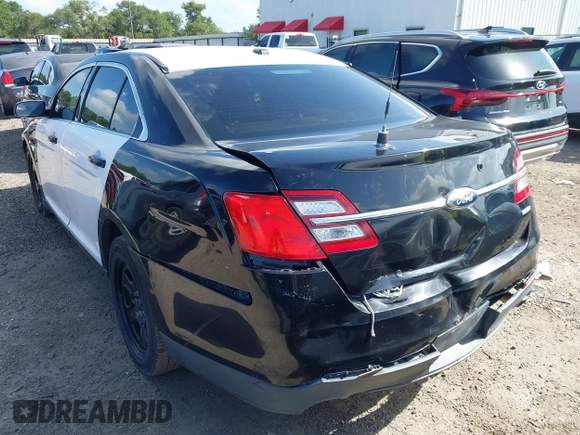 2014 Ford Police Interceptor with VIN 1FAHP2MK8EG185666, listed as a IAAI auction lot 42608018 with 141,523 mi miles and . Bid and sale history available at DreamBid. Image 3.