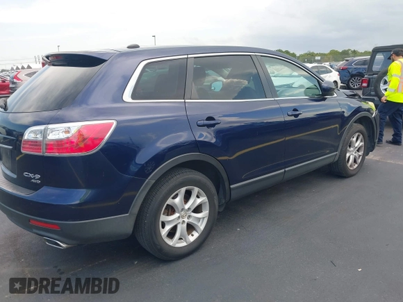 2012 Mazda CX-9 Touring with VIN JM3TB3CV3C0334924, listed as a IAAI auction lot 42372439 with 166,580 mi miles and . Bid and sale history available at DreamBid. Image 4.