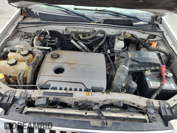 2009 Mercury Mariner Hybrid with VIN 4M2CU29369KJ14719, listed as a Copart auction lot 62511705 with 144,062 mi miles and Salvage title. Bid and sale history available at DreamBid. Image 12.