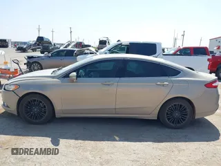 2015 Ford Fusion SE with VIN 3FA6P0HD2FR113069, listed as a IAAI auction lot 42336598 with 136,927 mi miles and . Bid and sale history available at DreamBid. Image 14.
