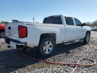 2016 Chevrolet Silverado 1500 LT with VIN 3GCUKREC5GG247586, listed as a Copart auction lot 49600245 with 218,489 mi miles and Salvage Title. Bid and sale history available at DreamBid. Image 3.