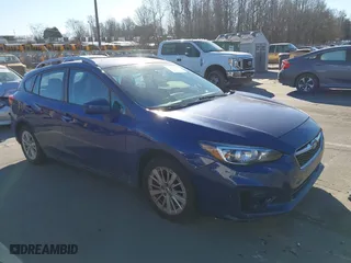 2017 Subaru Impreza Premium with VIN 4S3GTAB66H3750736, listed as a IAAI auction lot 41465017 with 144,289 mi miles. Bid and sale history available at carsss.com. Image 1.