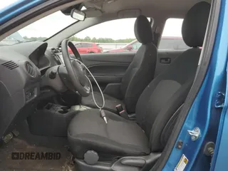 2021 Mitsubishi Mirage ES with VIN ML32AUHJ4MH006307, listed as a Copart auction lot 57297285 with 64,527 mi miles and Salvage title. Bid and sale history available at DreamBid. Image 7.