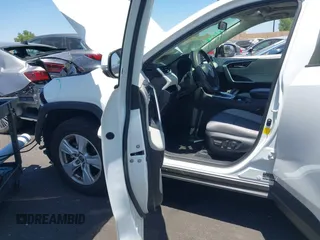 2019 Toyota RAV4 XLE with VIN JTMP1RFV8KD025971, listed as a IAAI auction lot 42673361 with 69,241 mi miles and . Bid and sale history available at DreamBid. Image 5.