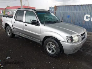 2005 Ford Explorer Sport Trac XLS z VIN 1FMZU67K95UA87785, wystawiony jako IAAI lot #42207437 z przebiegiem 195 682 mil mil oraz . Historia ofert i sprzedaży dostępna na DreamBid. Obrazek 1.