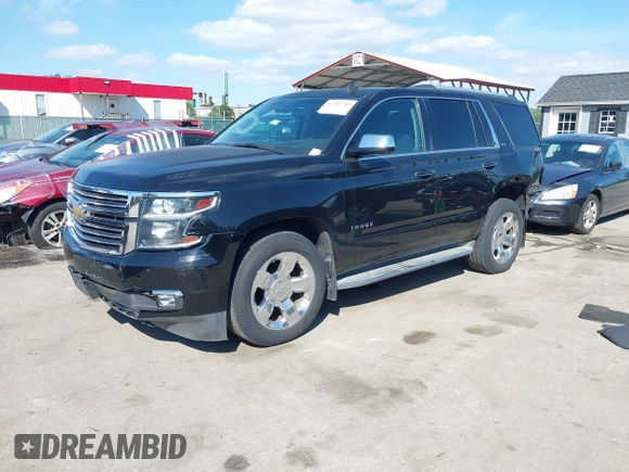 2015 Chevrolet Tahoe LTZ z VIN 1GNSKCKC3FR104845, wystawiony jako IAAI lot #42291785 z przebiegiem 75 047 mil mil oraz . Historia ofert i sprzedaży dostępna na DreamBid. Obrazek 20.