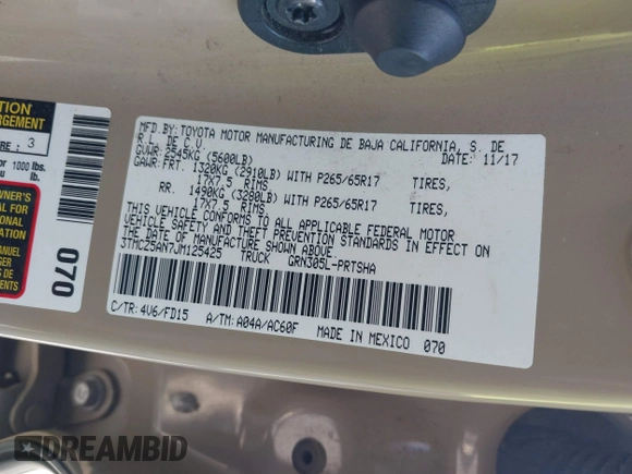 2018 Toyota Tacoma SR z VIN 3TMCZ5AN7JM125425, wystawiony jako IAAI lot #40459066 z przebiegiem 85 182 mil mil oraz . Historia ofert i sprzedaży dostępna na DreamBid. Obrazek 9.