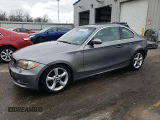 2009 BMW 1 Series 128i with VIN WBAUP93589VF48224, listed as a Copart auction lot 85687834 with 106,636 mi miles and Salvage title. Bid and sale history available at DreamBid. Image 1.