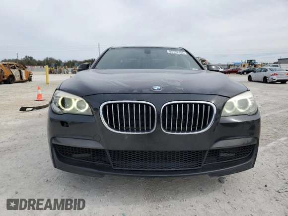 2015 BMW 7 Series 740i with VIN WBAYA6C50FD826727, listed as a Copart auction lot 82197433 with 241,799 mi miles and . Bid and sale history available at DreamBid. Image 5.