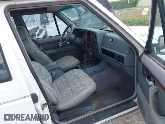 1993 Jeep Cherokee Country with VIN 1J4FJ78S2PL578769, listed as a IAAI auction lot 42732237 with 102,314 mi miles and . Bid and sale history available at DreamBid. Image 5.