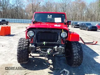 2015 Jeep Wrangler Unlimited Sahara with VIN 1C4BJWEG1FL748732, listed as a IAAI auction lot 41779308 with 109,986 mi miles. Bid and sale history available at carsss.com. Image 13.