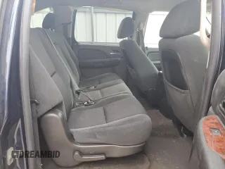 2009 Chevrolet Suburban 2LT z VIN 1GNFC26039R220026, wystawiony jako Copart lot #55475715 z przebiegiem 137 480 mil mil oraz Szkoda całkowita • Salvage title. Historia ofert i sprzedaży dostępna na DreamBid. Obrazek 11.