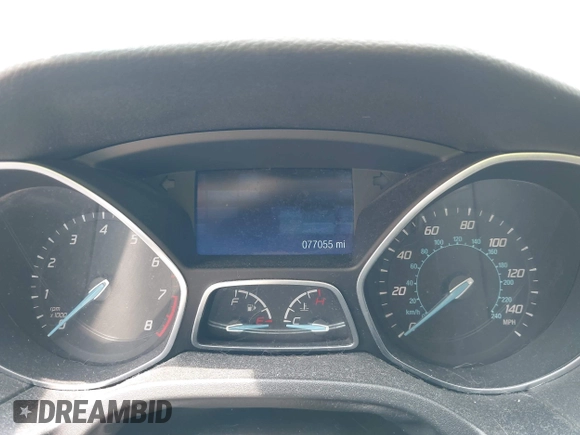 2014 Ford Focus SE z VIN 1FADP3K27EL459969, wystawiony jako IAAI lot #42412165 z przebiegiem 77 055 mil mil oraz . Historia ofert i sprzedaży dostępna na DreamBid. Obrazek 7.