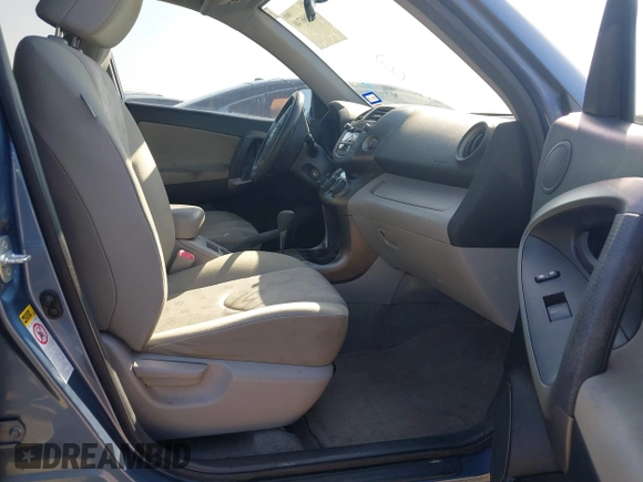 2009 Toyota RAV4 with VIN JTMZF33V49D008249, listed as a IAAI auction lot 41966740 with 214,352 mi miles. Bid and sale history available at carsss.com. Image 5.