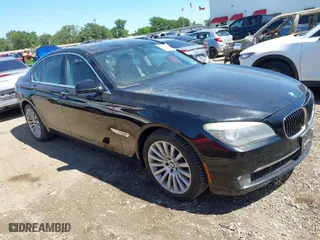 2012 BMW 7 Series 750i with VIN WBAKA8C50CCY37892, listed as a IAAI auction lot 42080313 with 148,058 mi miles. Bid and sale history available at carsss.com. Image 1.