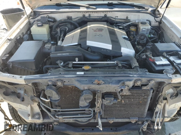 2004 Lexus LX 470 z VIN JTJHT00W743547721, wystawiony jako Copart lot #43739705 z przebiegiem 231 378 mil mil oraz Szkoda całkowita • Salvage title. Historia ofert i sprzedaży dostępna na DreamBid. Obrazek 12.