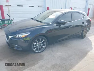 2018 Mazda 3 Touring with VIN 3MZBN1L30JM247097, listed as a IAAI auction lot 41803062 with 61,345 mi miles. Bid and sale history available at carsss.com. Image 2.